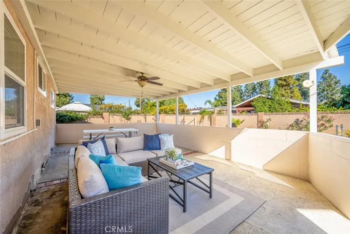 Spacious backyard with covered patio