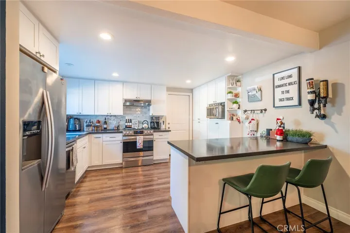 Full Kitchen with Direct Garage access. Laundry is in Garage to the left when you walk in.