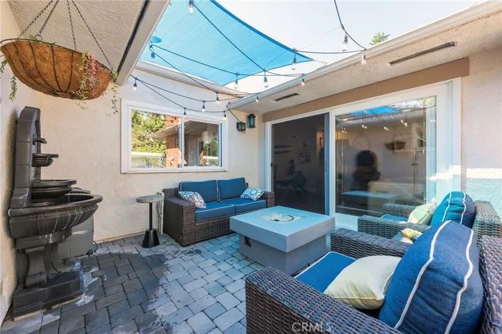 Private Patio with view of kitchen window and large slider to the Living room