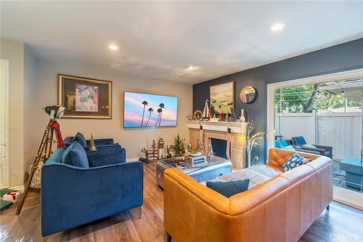 Cozy Living Room with Fireplace and large slider to patio