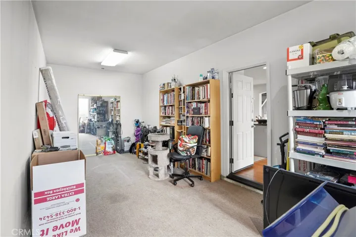 Downstairs: 2nd Bonus room- This use to be the 3rd car tandem garage. Currently used as a storage/workout room. Can be an additional bedroom or converted back to a garage.