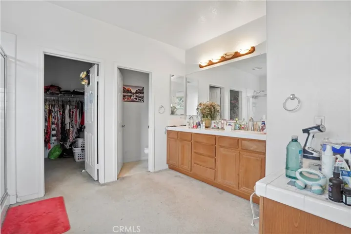 Upstairs: Main Suite private bathroom with double sink and large walk-in closet