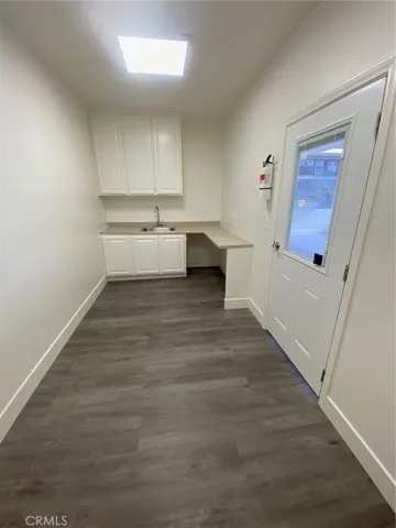 Kitchen with additional work or dining space
