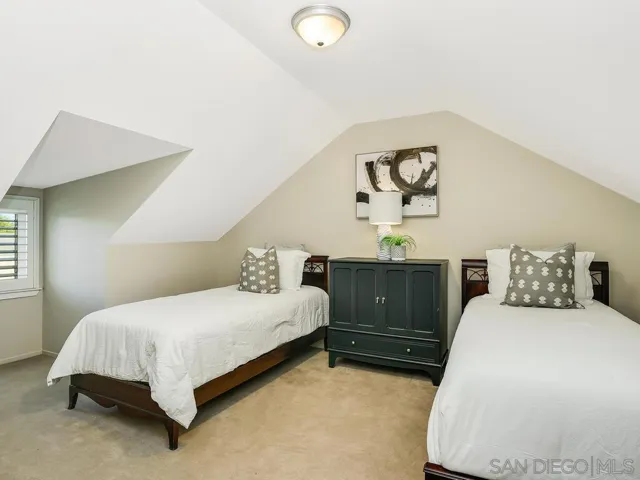 one of two bonus rooms built upstairs, complete with a closet