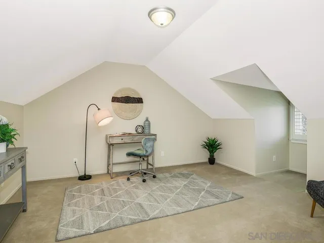 one of two bonus rooms built upstairs with closet