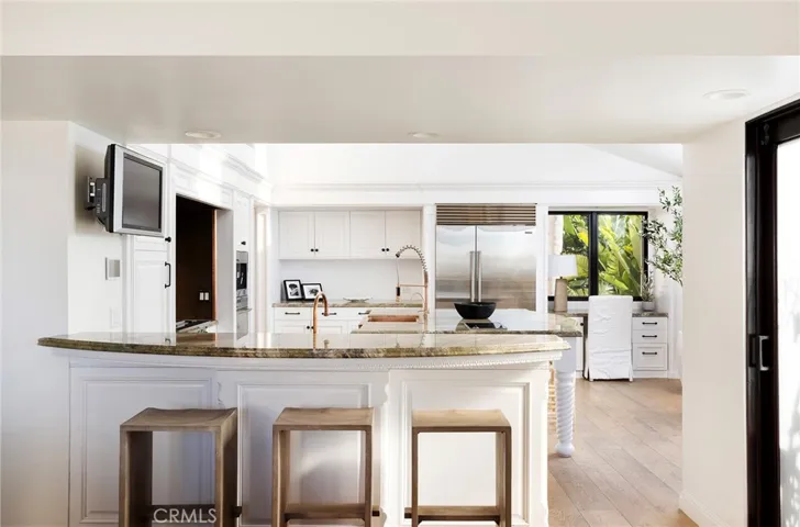 Kitchen with additional bar seating