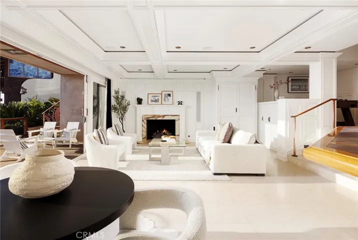 Downstairs media/family room with fireplace