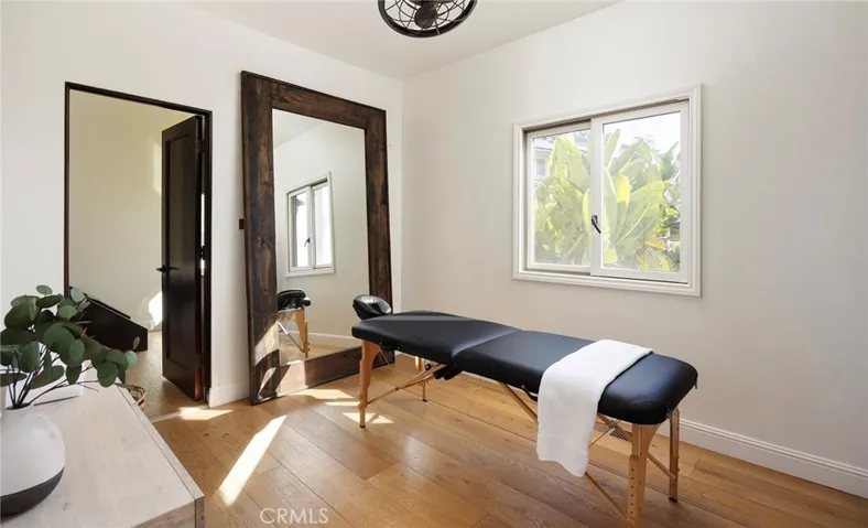 Main floor Secondary Bedroom/gym/massage room with ensuite bath