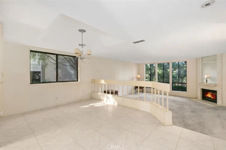 LARGE FORMAL DINING AREA, VIEW OF TREES ON GOLF COURSE.