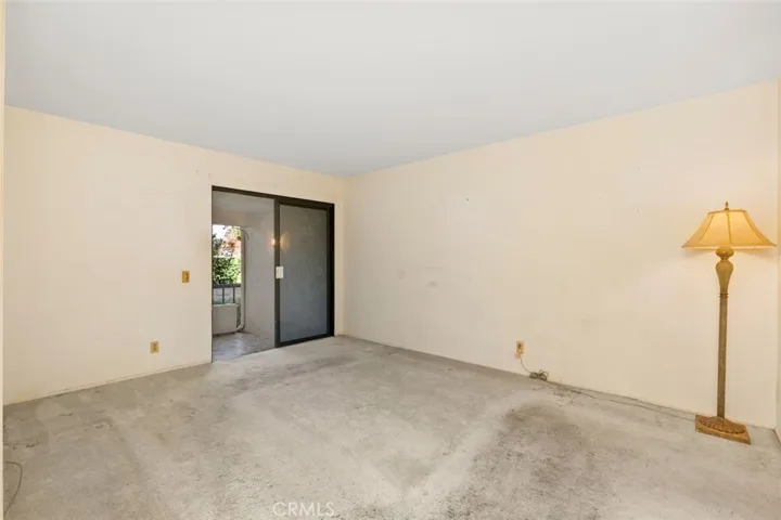 MASTER BEDROOM NEEDS COSMETIC WORK, ROOM IS VERY LARGE , HAS A GREAT OUTDOOR PATIO .