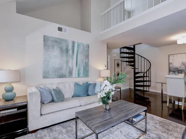 Spiral steps lead to a spacious loft