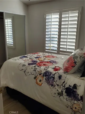 Guest Bedroom with Mirror closet doors