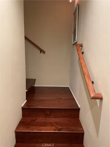 2nd view of staircase to lower level