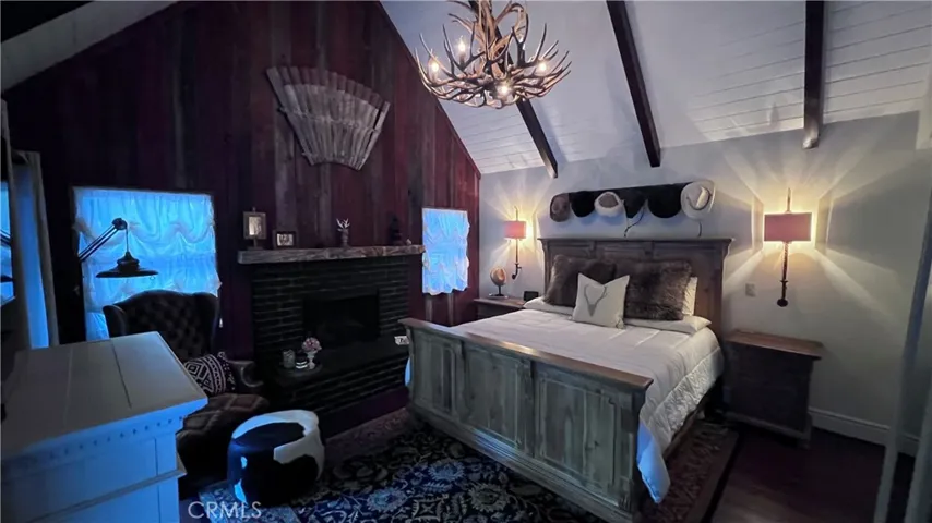 Main level En Suite Bedroom with it's own fireplace
