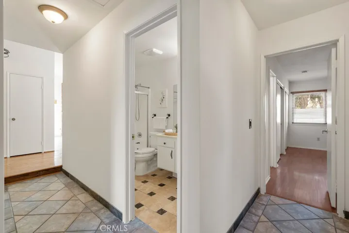hall bathroom and primary bedroom doors
