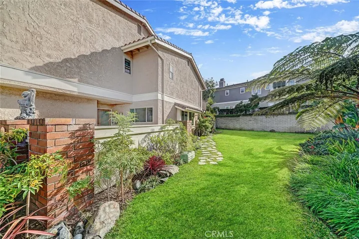 Large grassy area next to the home