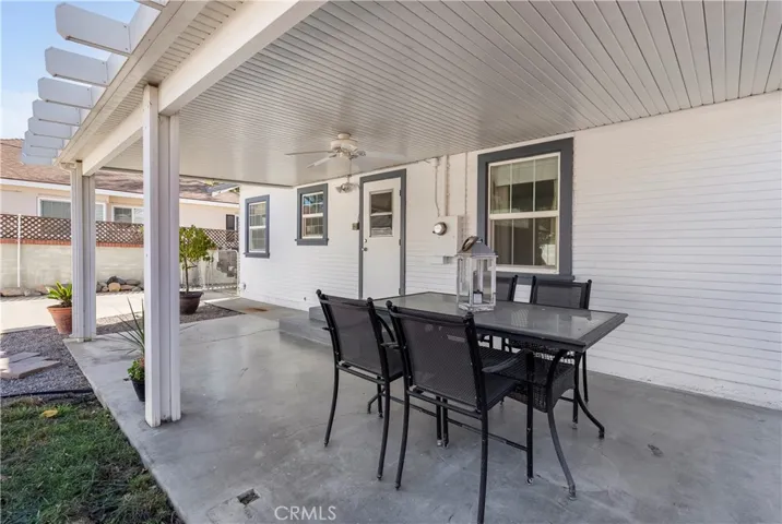Lovely permitted 12 x 24 patio cover with ceiling fan.
