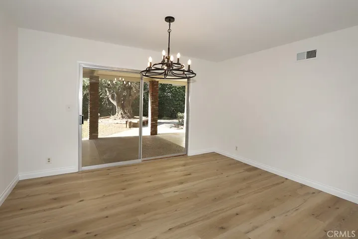 Dining room with slider to back patio