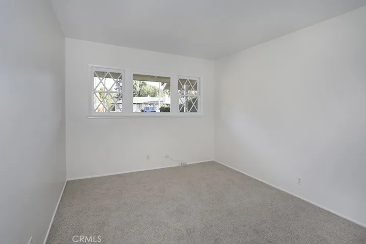 Guest bedroom 2 overlooking the front lawn