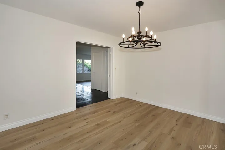 Alternate view of dining room looking back to the entry and living room