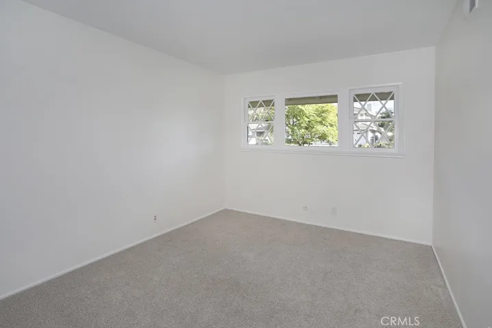Guest bedroom 3 along the middle of hallway