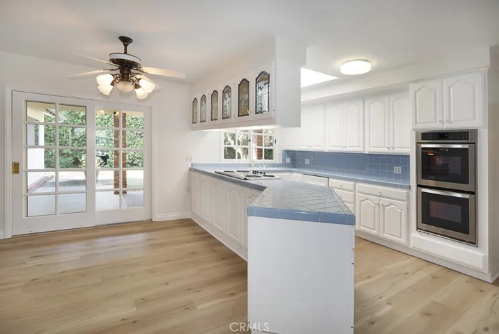 Breakfast nook and kitchen. Doors open to LARGE back patio