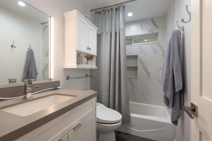 Remodeled by the former owner, the Hall Bath offers Tub/Shower combo, Quartz counters & great light