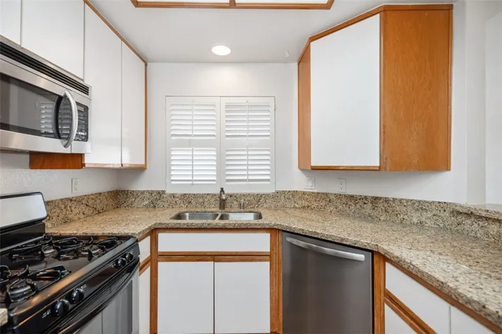 Kitchen with Stainless Steel Appliances and Granite Counters
