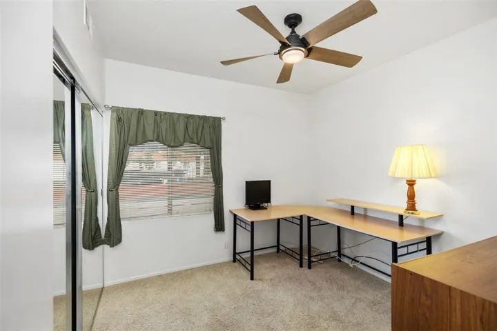 Secondary Bedroom Being Used as an Office  Desk Included with Sale of Property