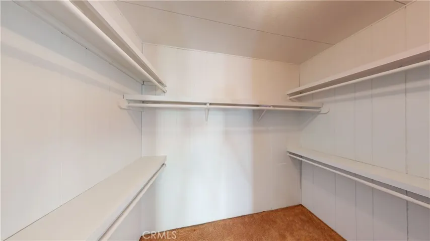 HUGE WALK IN MASTER  Lighted  Behind Double Sliding Mirrored DOORS