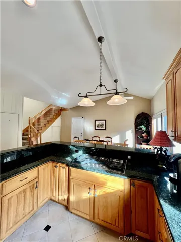 View of kitchen to counter seating