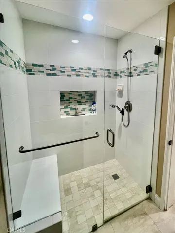 Walk in shower with no step and bench!