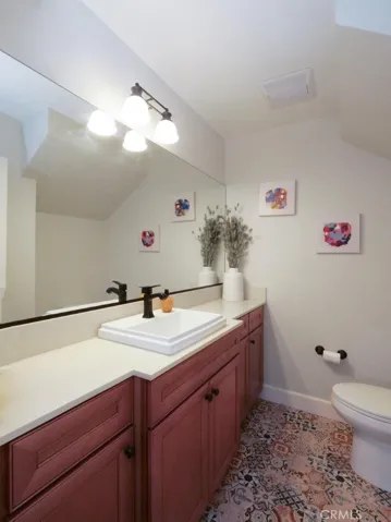 Half Bath on Main Floor w/ pretty Spanish tile floor