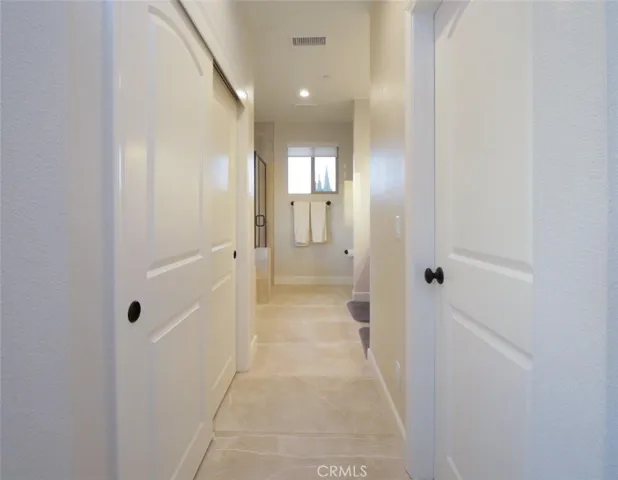 Two Large Closets with Shelves. Right side is walk-in closet.