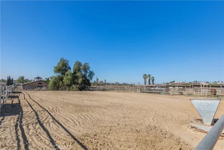 Large horse arena. Property ends at the trees