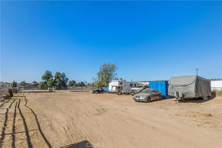 Expansive open flat lot with spacious trailer parking