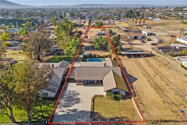 Amazing 1.25 acre flat lot with pool and horse facilities