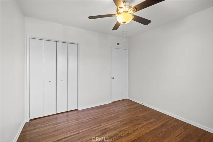 Bi-fold doors accent the closet which provides ample room for storage.
