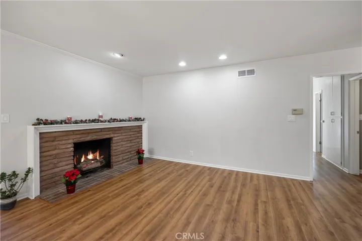 From the living room is the hallway which leads to the 4 bedrooms and 2 baths. Home provides forced air for heating.