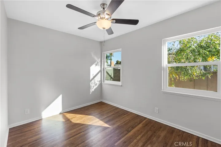 3rd bedroom has 2 new double pane windows that view the east side yard. Ceiling fan is new. Hardwood floors were refinished. Wall were freshly painted.