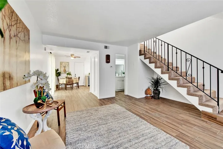 downstairs living room, 1/5 bath and breakfast nook.