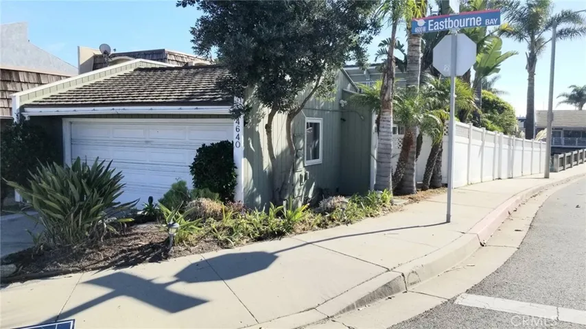 Front of property, corner lot, 2 car garage