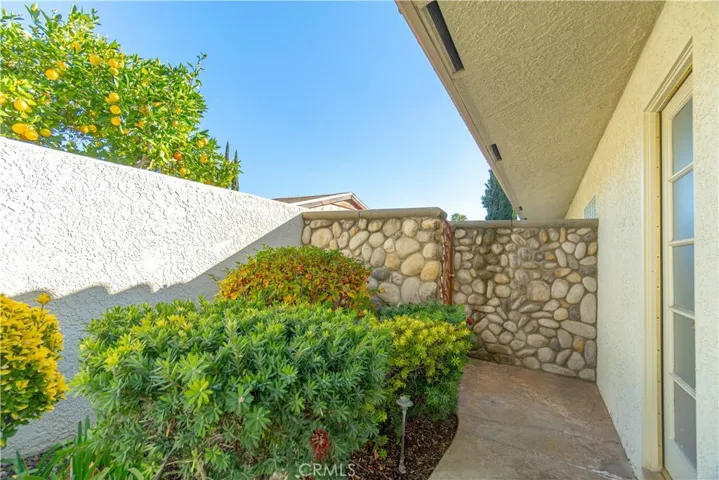 West side yard and bathroom for pool guests