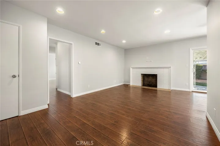 Family room with wood burning fireplace