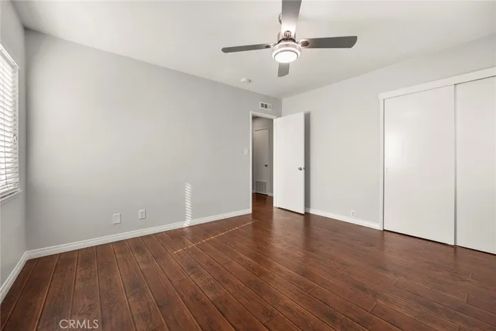 Bedroom 3 with double slider closet and new ceiling fan