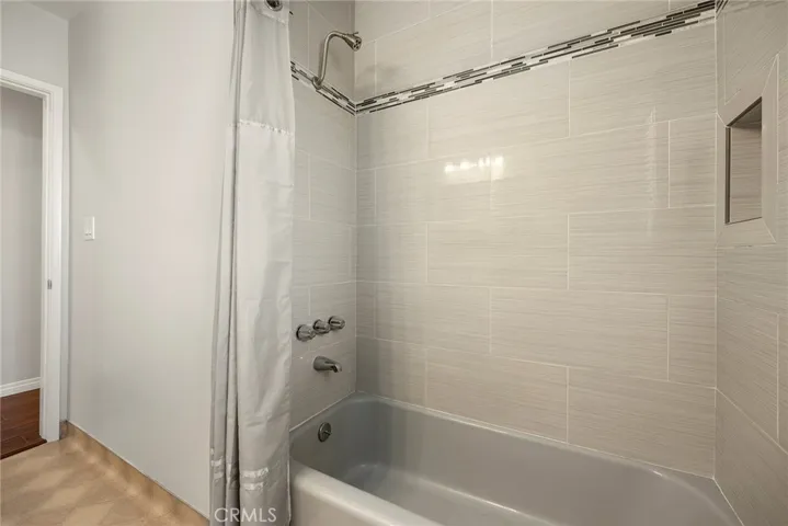 Bathroom 2 with updated tiled tub/shower