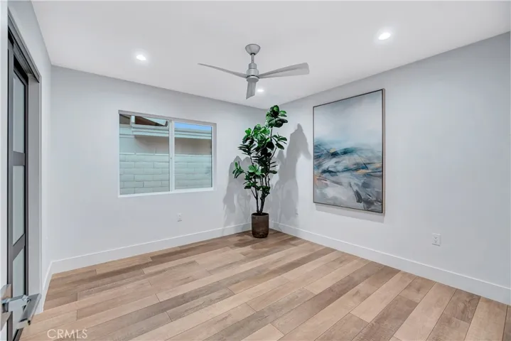 Third Bedroom or Office With Recessed Lighting and Modern Ceiling Fan