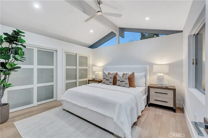 Second Bedroom is Spacious With Vaulted Ceilings and Glass Angled Panels