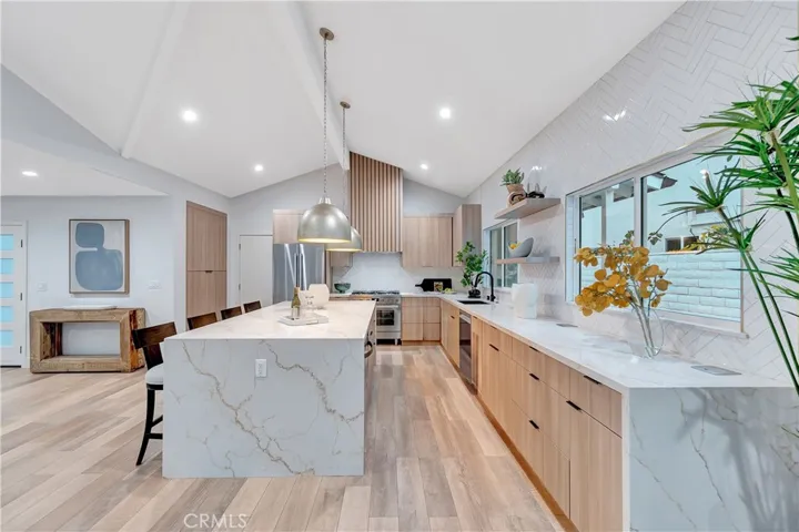 Sleek Quartz Counters With Waterfall Detailing