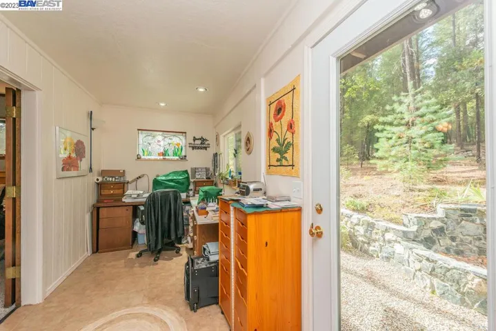 Bonus room off of the Master Bedroom with door leading to back patio.